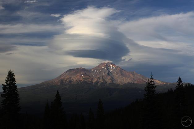 The clouds begin to expand over Mount Shasta.