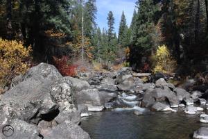 Large boulders dot a section of the McCloud River