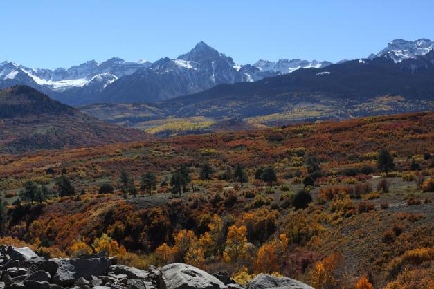Incredible fall color highlights the view of Mount Sneffels.